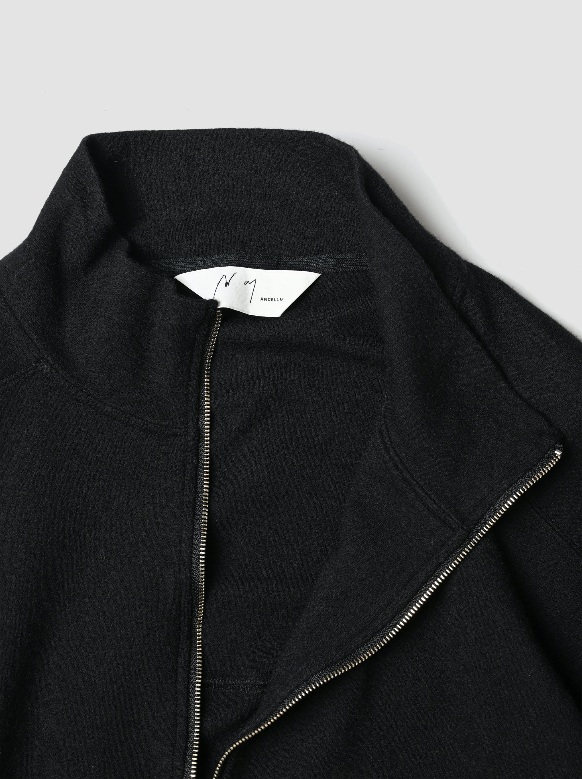 ANCELLM / SHRINK WOOL ZIP UP STAND BLOUSON -BLACK