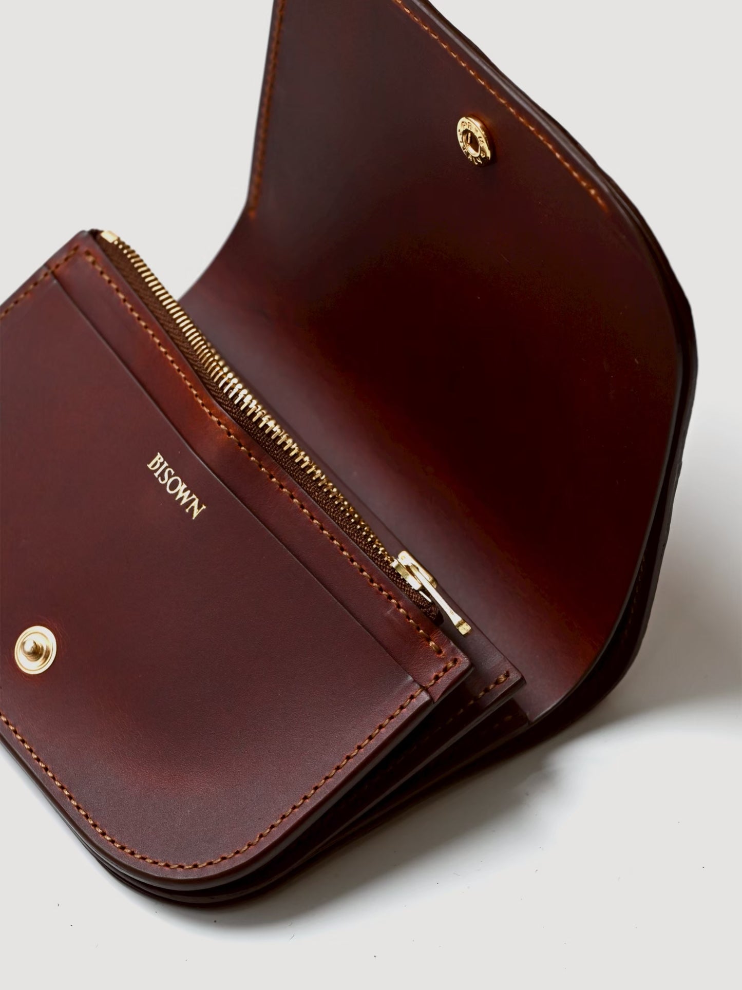 BISOWN / BOAT WALLET OSTRICH -CHESNUT